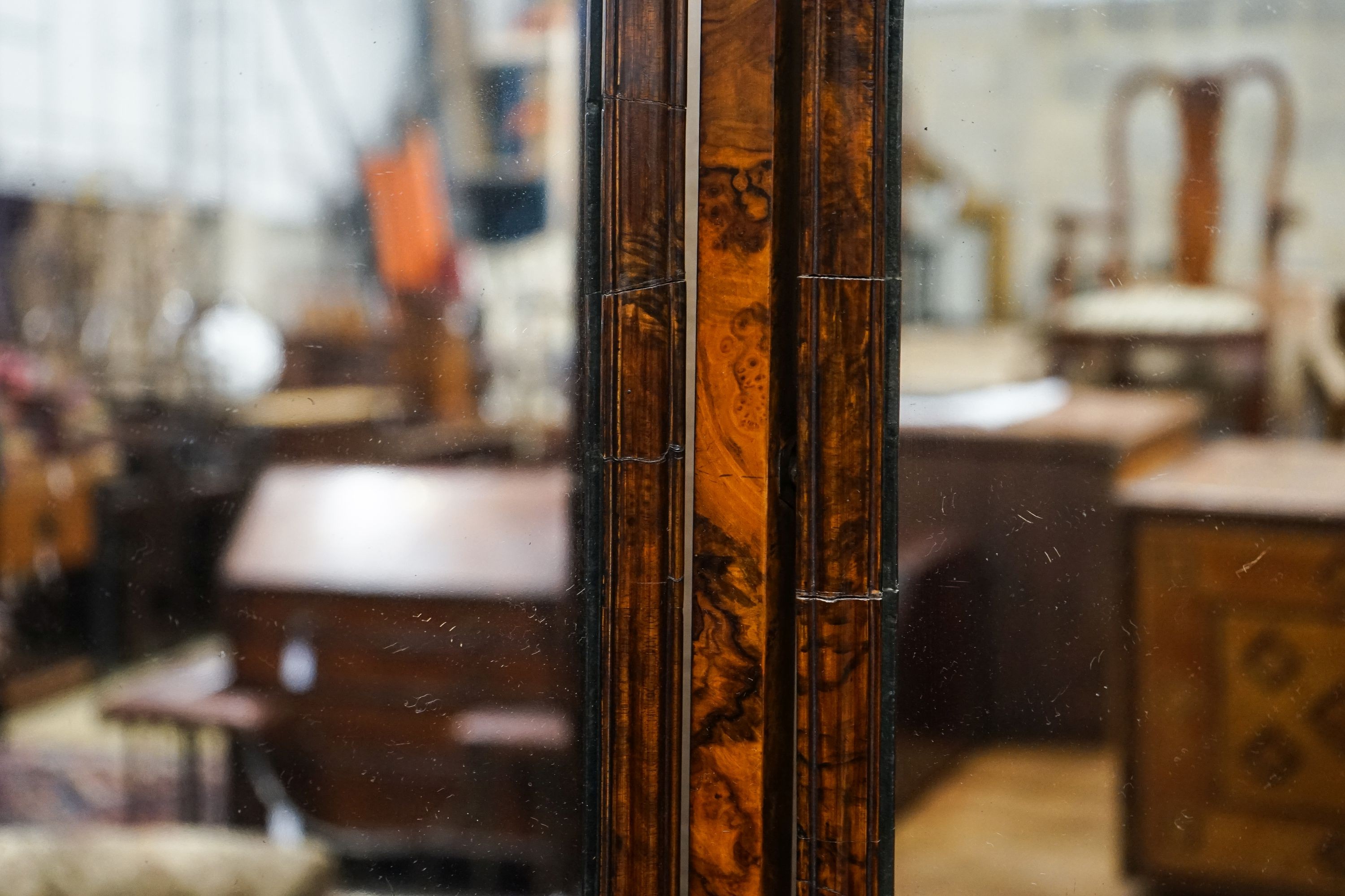 A Queen Anne revival walnut triple dressing table mirror, maximum width 112cm, height 89cm